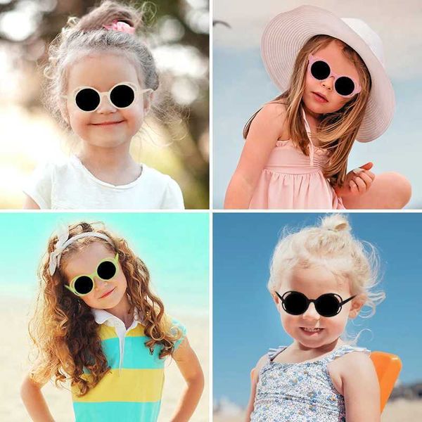 Occhiali da sole 2024 Nuovi bambini simpatici bordo vuoto round cornice Uv400 occhiali da sole bambine per protezione solare da sole da sole occhiali da sole da sole