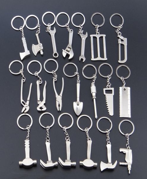 Tragbare Schlüsselbund -Haus -Wesentliche Werkzeuge Edelstahlkettenringe kreative Mini Axt Sägeschlüssel Hammerform Keyring Geburtstagsgeschenk4948981