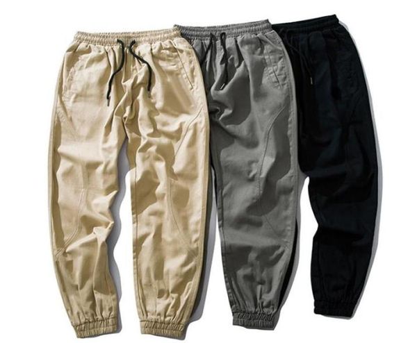 Calça de reprodutores de 20ss masculinos de outono bordando sportswear sportstring tracksuit casual sweatpantes calças de designer branco preto Jogg9451993