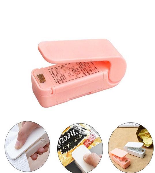 Bolsa de armazenamento de cozinha Clipes portátil Mini Máquina de vedação de calor pequeno Aquecimento portátil Selo de vedação de vácuo Pacote sacos de plástico Pink W7799232