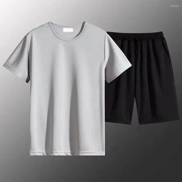 Traccetti da uomo Allenamento set di attrezzature casual T-shirt gamba larga pantaloncini sportivi a colore solido Outfifit di abbigliamento sportivo con elastico in fila sciolta