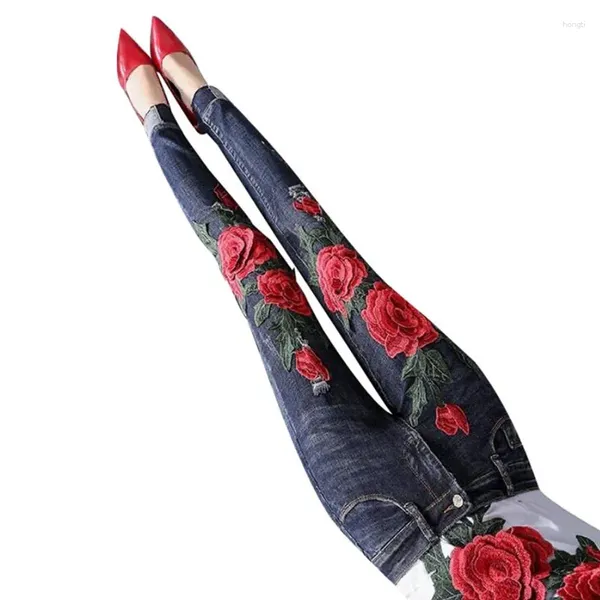 Jeans jeans streetwear fiore ricamato da donne allunga i pantaloni a matita magra buca alla moda strappato pantaloni di denim Q392