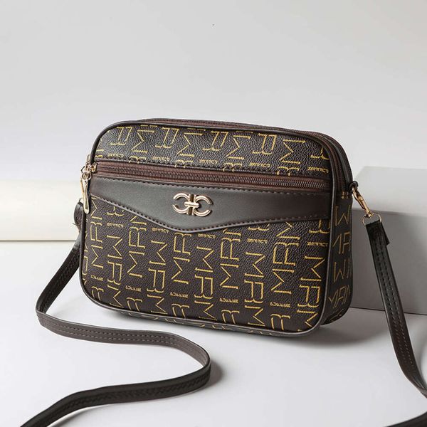 Vier Reißverschluss Kamera 2024 Neue Pu Textur Crossbody Printbody Vintage -Tasche 80% Fabrik Großhandel