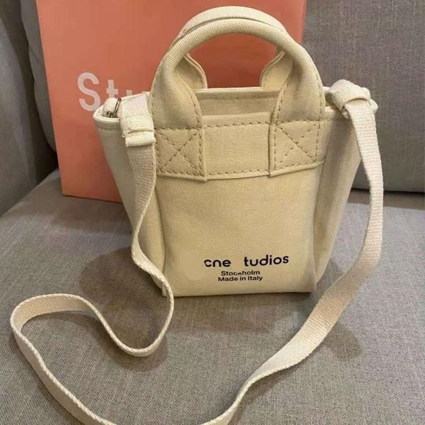 Cruz Body Acne Canvas de Tote Bag2021europeia Americana Americana Bagcanvas Bag portátil Messenger Bag Pack de grande capacidade 236z