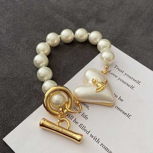 Designer Westwood Saturn Pearl Bracciale per le donne Spring New High End Unique Design French Style su Dem Hicraft