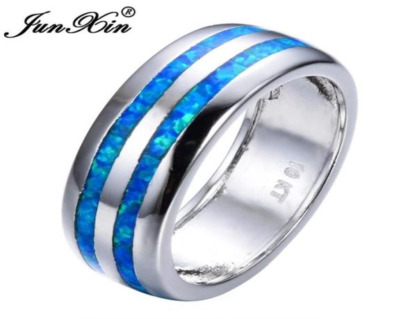 Junxin Fashion Women Blue Fire Opal Ring di alta qualità 925 Gioielli pieni in argento sterling Promessa anelli di fidanzamento per le donne S181015991547