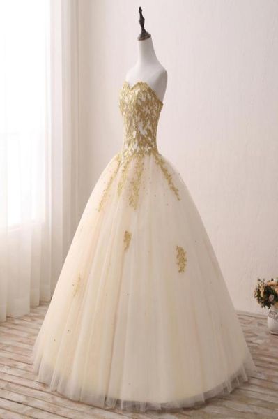 Vestido de bola de bola de apliques de ouro do novo vestido quinceanera 2018 Sparkle Crystal Tulle Floorlen Comprmen 16 Dresses 15 anos Vestidos de baile BQ428448365