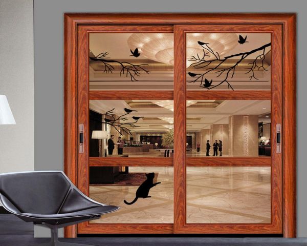 Katze, die die Vögel unter dem Baum Wandtaste Aufkleber schwarzer Vogel auf dem Baumzweigwand Kunst Wander Fensterglas Wand Deco2036540 jagt