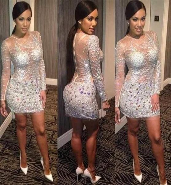 2015 Kim Kardashian vestidos de manga longa de decote ilusão de ilusão bainha vestido de festa de festa sexy e lantejoulas de prata 3783541