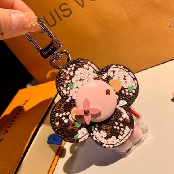 1990 todas as séries Chaves de girassol Wallet Luxury Color Rhinestone Letter Doll ChainChain Fun Car Pingente Brand Casal Bags Totes Pingente Key 260p