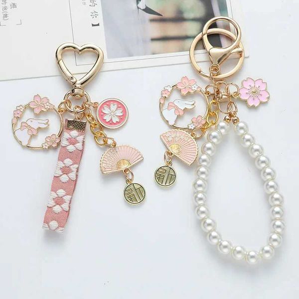 Keychains Lanyards Korean süße Kirschblüten Kaninchen Keychain Damen Kreatives Band Perlen Schlüsselbund Handtasche Kopfhörer Box Anhänger Juwely J240509