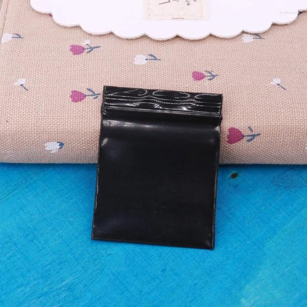 Mücevher torbaları 100pcs/lot siyah fermuarlı plastik torbalar kalınlaşmış poli küçük paketleme fıstığı paralar gıda depolama torbası fermuarlı kilit