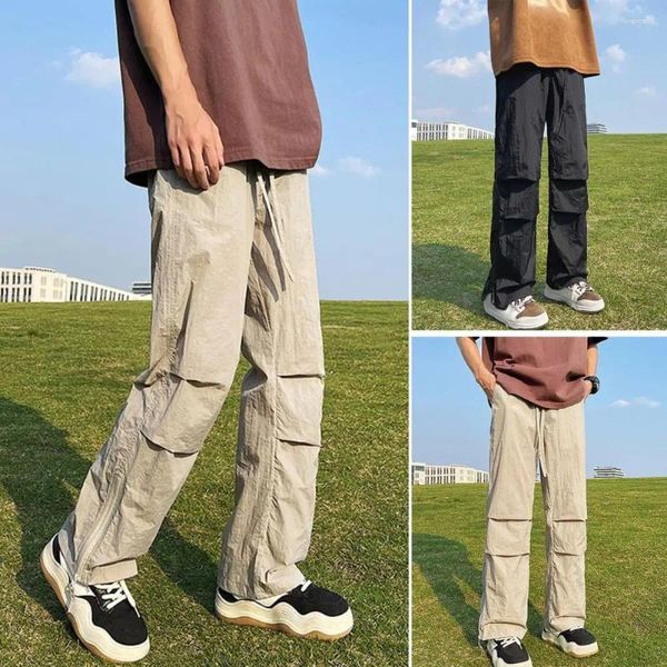 Pantaloni da uomo uomini che colano i pantaloni in vita elastica di grandi dimensioni con tasche late