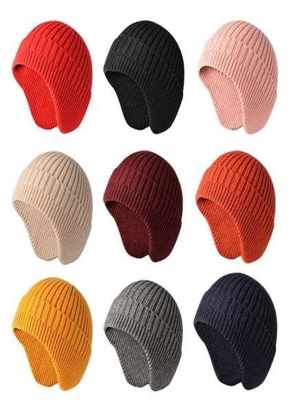 Шапочки мода теплой вязаная шляпа с ушной ушной зимой для мужчин Женские шапки черепа на открытом воздухе.