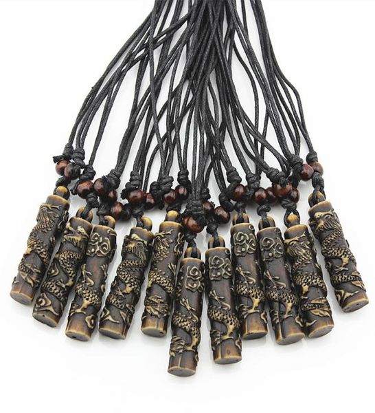 Schmuck Whole 12pcs Cool Boy Men039s Simulation Knochenschnitzer Totem Drache Anhänger Holzperlen Amulett Anhänger Halskette Lucky 5520745