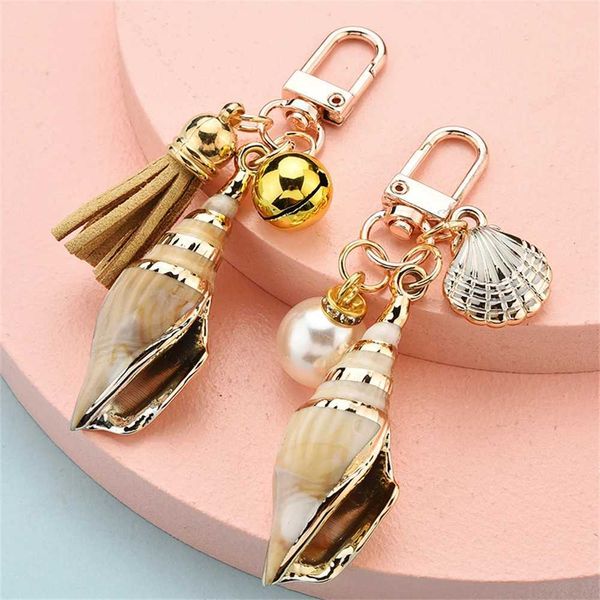 Chaços de chaveiros novos belos conchas de cochas pérolas tlassel encharms feminino ornamentos de moda acessórios de souvenir presentes j240509