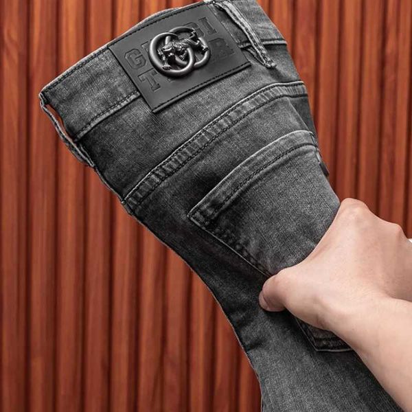 Jeans masculinos 2024 Nova Economia de ponta High Economia de luxo Moda Moda Slim Fit Pants Tight Elastic Casual Completo Quadro Q240509