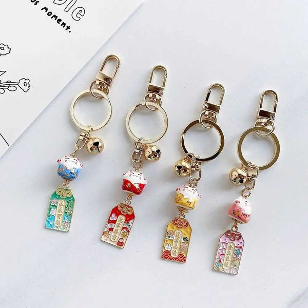 Keychains Lanyards niedlich Amulett Lucky Cat Keychain mit Bell Keramik Keychain Maneki Neko Auto Bag Anhänger Mobiles Zubehör Paar Geschenk J240509