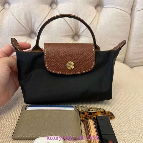 Tasarımcı Çanta Mağazaları Yüksek Sürüm Mini Hamurlu Cep Telefonu Sıfır Cüzdan Elde Taşınan Tek Omuz Crossbody Yok Strap6ggg