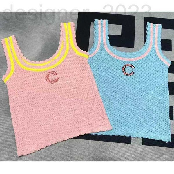 Tanques femininos Designer Camis Designer colorido colete de malha bordado para o design da borda de onda do pescoço da primavera/verão da primavera/verão com uma sensação de camisola D458