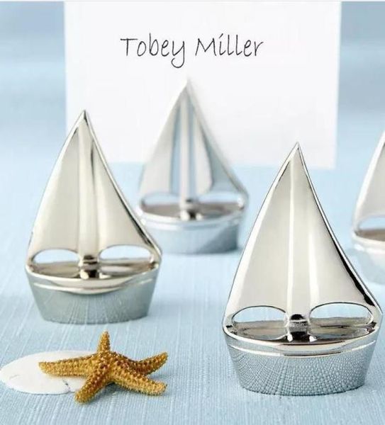 Thotochi di carta Silver Sailboat Place con carta abbinata per matrimoni in spiaggia e decorazioni per feste3129098