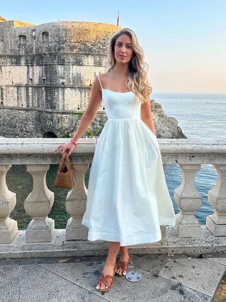 Damenkleid elegante und schöne Midi White Ferienkleid Italienische Spaghetti Schultergurt Beach Kleid First Line Party Kleid 2023 240509