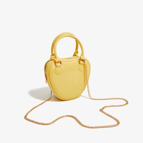 Großhandelsprodukte Modetrendketten Cross Body Bag Inspirierte Designer Mini Frauenhandtasche Liebe Form Damenwechselbeutel