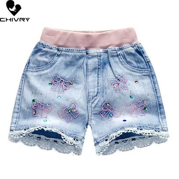 Shorts Novos 2022 crianças e meninas de verão shorts meninas meninas fofas de desenho animado bordados shorts de jeans casuais de jeans D240510