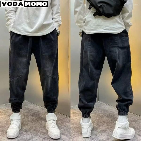 Jeans masculinos Spring e Autumn Moda Slim High Street Pintura de rua magro Tubo reto de tubo reto solto desgastado