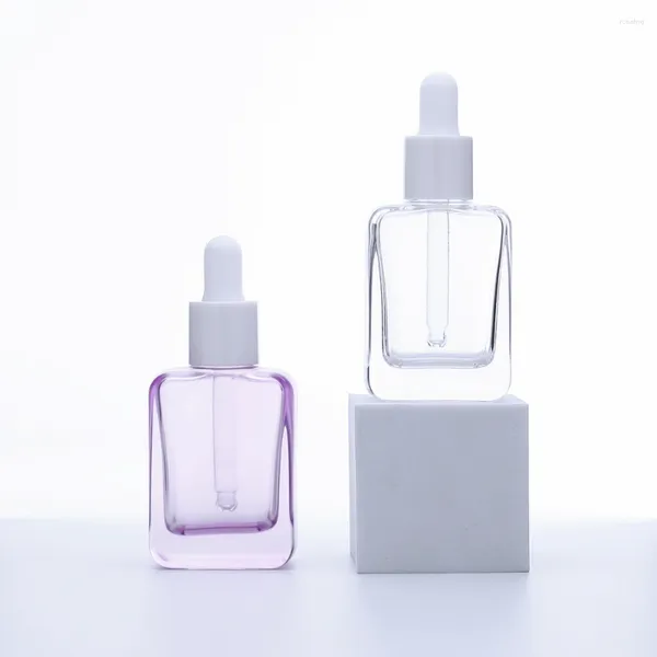 Garrafas de armazenamento 100pcs 30 ml transparente de púrpura de vidro retangular Garraco de óleo essencial com tampa