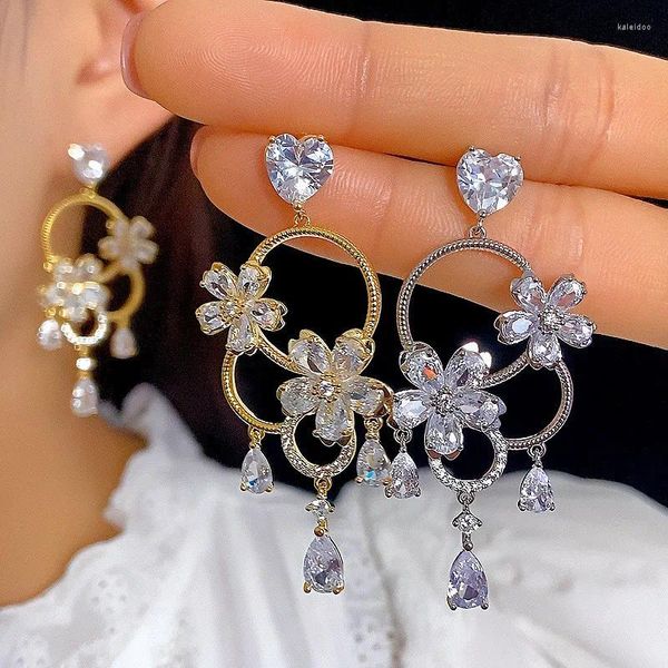 Dangle Ohrringe Xuye Mode exquisite CZ Steinblume Quasten Marke Design Europa und Amerika Wassertropfen Juwel