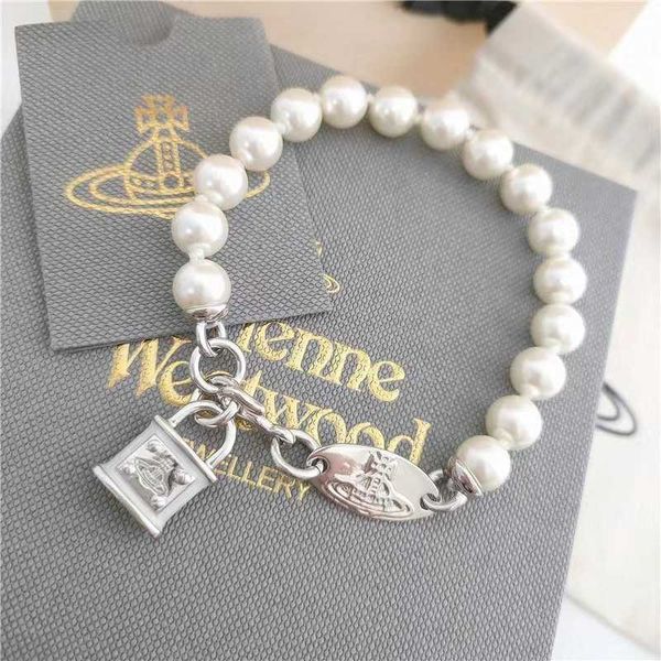 Charm Westwood New Lock Head Bracciale Pearl Womens Personali sterioscopici in stile punk personalizzato