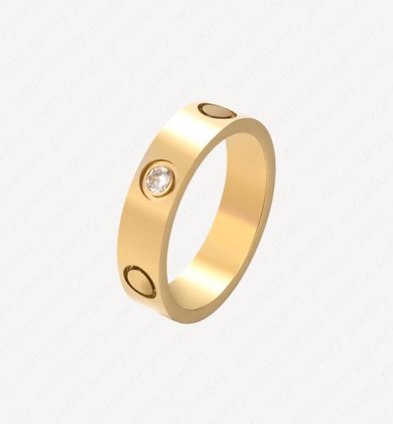 2020 neuer klassischer Edelstahl Gold Liebe verheiratetes Verlobungspaar Ring für Frauen Mode Eternal Zirkon Schmuck für Frauen W7982810