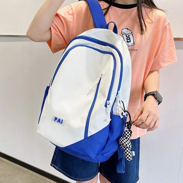 Backpack Versão coreana de mantas de grande capacidade japonesa de grande capacidade e fêmea sacos do ensino médio viajam duplos