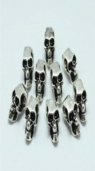 100pcslot Evil Skull Heads Scheletro in lega di zinco Grande buca perle si adattano al braccialetto a catena europea Paracord Accessorio3569934