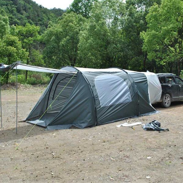 Tende e rifugi hanno aggiornato la tenda posteriore SUV con baldacchino di pioggia tra cui un paio di pali di supporto per l'attrezzatura per il turismo da campeggio all'aperto 5-8 Peopleq240511