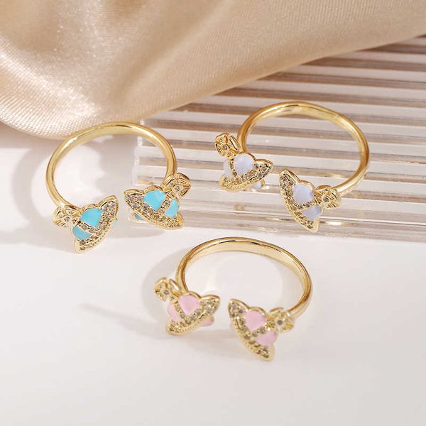 Дизайнерский свет роскошный 18 -километровый золото, покрытый Westwoods Ring Dewelry Модный микроат с полным бриллиантом Saturn Sweet и Personalized Handcraft для женщин ногтя