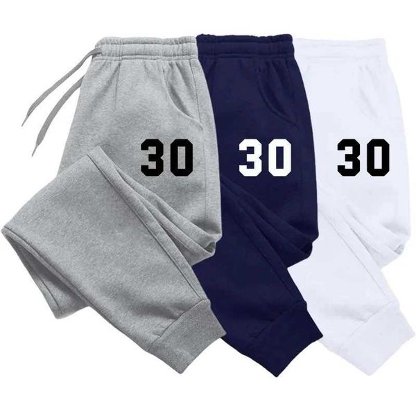 Calças masculinas moda homens novos homens imprimem calças casuais longas vendas quentes calças de moletom e esportes de jogging confortáveis e versáteis Y240513