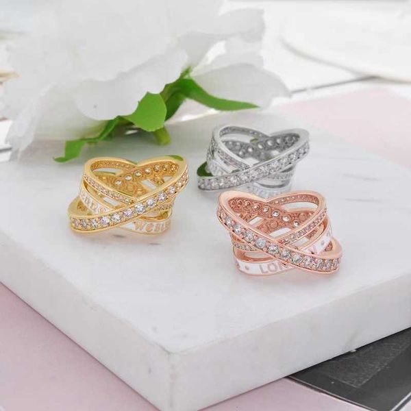 Marca Westwoodsenne Cross Ring Personalidade feminina Sweet Fold Wind três sobreposição de Saturn qixi unha de presente