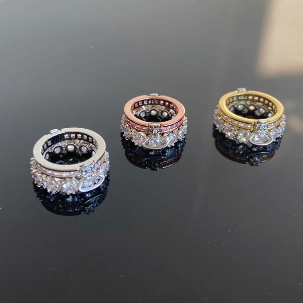 Marca Westwoods usa um anel de diamante sobreposto em fêmea de cobre fêmea de cobre 18k Double Cayer Zircon Saturn Index Nail
