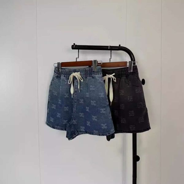 Jeans femininos Qualidade do petróleo sul CE Casa 24 Verão Novo arco triunfal desgastado cintura elástica de cordão versátil shorts jeans soltos para mulheres