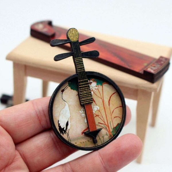 Novo modelo de instrumentos folclóricos musicais de estilo de boneca em miniatura