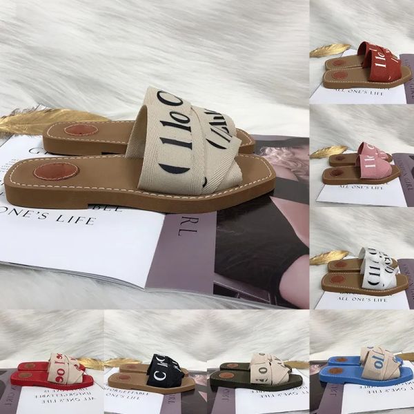 2024 Sandálias Woody for Womens Senhoras Lettering Tecla Canvas Mules Saltos baixos Moda Moda Senhora Lúdica de verão Sapateiros casuais chinelos chioe Wood Slide