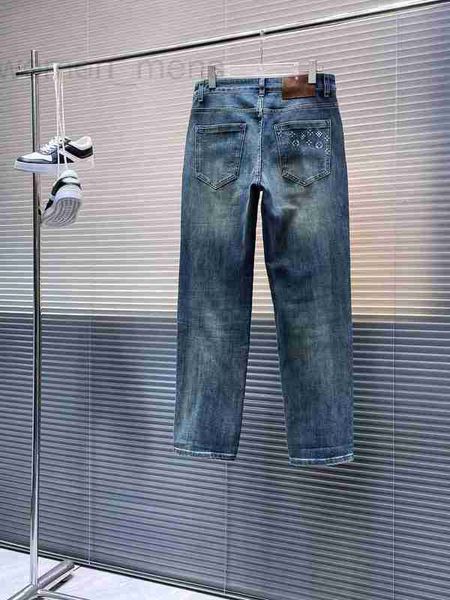 Jeans de jeans masculino calça jeans FIT CLASSEIRAS TRUE ESTRETTROURSERS Bordado Pattern Pattern por atacado Motocicleta roxa Slim 7jtr