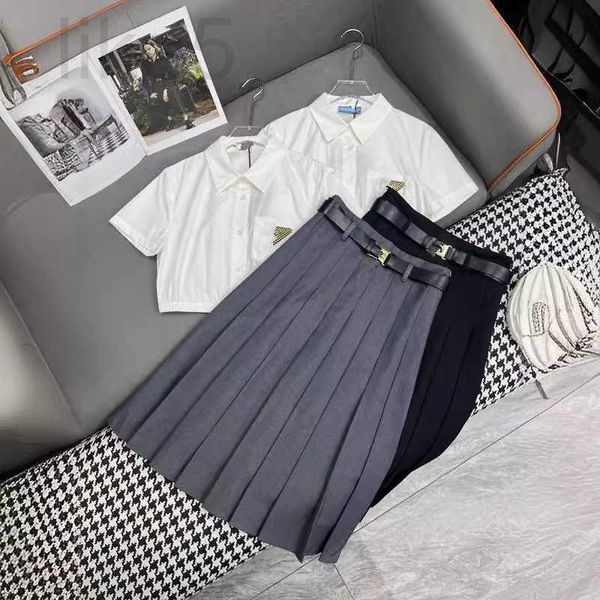 Die zweiteilige Kleiderdesignermarke Nanyou Pra ist modisch, elegant und elegant mit einem kurzen Hemd gepaart, Faltenrock für Frauen A0HM