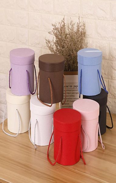 Caixas de papel de flor redonda Lid Hug Florist Flower Hold the Bucket Presente Box Pacoting Gift Candy Bar Party Wedding Gift Storage Box7889104