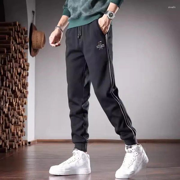 Pantaloni da uomo Pantaloni sportivi neri a righe laterali moda Uomo Autunno Sport casual Pantaloni da jogging slim fit a matita invernali con coulisse elastica