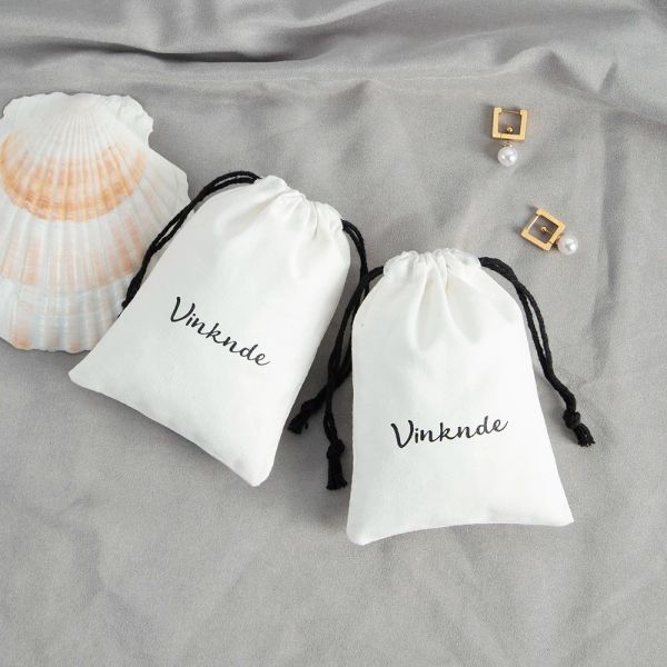 Pacote de jóias 50pcs bolsas de musselina logotipo personalizado algodão jóias bolsas de jóias de jóias de saqueta para brindes de noiva Favoras de festa diy