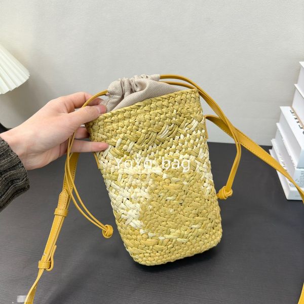 Borsa da donna di marca famosa Borsa di paglia scavata di marca Borsa di carta tessuta di moda Borsa da spiaggia estiva Borsa a secchiello