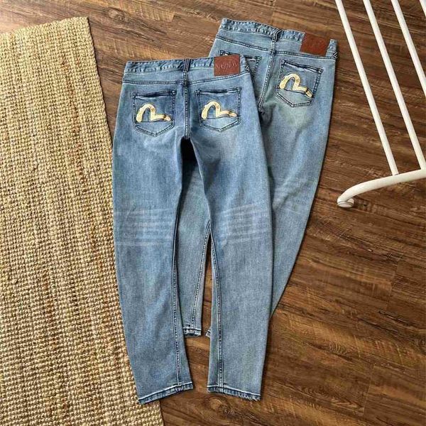 2024 outono nova marca de moda fushen masculino nuvem colorida pequena gaivota bordada faca curva jeans nevoeiro